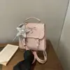 Mochila Transfronteriza 2026 Estilo Nuevo para Mujer, Bolso Escolar Casual de Moda Estilo Coreano para Estudiantes, Mochila Dulce de Lunares con Lazo