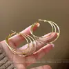Pendientes Dorados de Lujo Ligero Vintage de Alta Gama para Mujer 2026 Nuevo Estilo Pendientes de Perla con Agujas de Plata Diseño de Nicho Accesorios Metálicos para Orejas