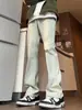 Jeans blancos de primavera y otoño para hombre, marca de moda, corte limpio, pantalones rectos holgados y versátiles, estilo callejero, pantalones ligeramente acampanados