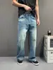 Jeans de mezclilla desgastados vintage retro lavados con bigotes de gato de corte recto holgado línea A, pantalones casuales versátiles para hombre y mujer