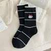Calcetines lindos de encaje a rayas para mujer, calcetines hasta media pantorrilla, calcetines de algodón de moda, calcetines largos de otoño de estudiante de dibujos animados japoneses de primavera y otoño