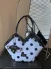 Bolso de gran capacidad para mujeres que van al trabajo, nuevo bolso tote de moda 2026 con lunares, bolso versátil y elegante de hombro y para llevar debajo del brazo