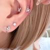 Aretes pequeños de mariposa con bloques de color, calados, diseño de nicho dulce y cool, para el cuidado de las orejas