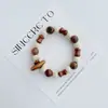 Pulsera de Cerámica Jingdezhen Nueva Historieta China Pulsera Boutique Venta al por Mayor Estudiante Joker Explosiones Puesto del Mercado Nocturno Pulsera