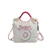 Bolsa de Dona de Nailon Bordada Estilo Ins Japonés 2025 Nueva Moda Mini Bolsa para Viajero Diario Bandolera de un Solo Hombro Bolsa Pequeña