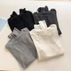 Camiseta elástica de mezcla de cachemira suave y pegajosa, amigable con la piel, de venta caliente, camiseta casual de manga larga para mujer de alta gama, capa base de otoño e invierno