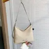 Bolso nuevo para mujer 2026 transfronterizo, estilo coreano moda retro patrón tejido bolso de mano para el día a día, bolso de hombro y cruzado simple tipo cubo