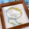 Pulsera trenzada artesanal de cuerda antigua chapada en oro con patrón de estrella de calabaza azul quemado, tendencia nacional chapada en oro de cobre al por mayor
