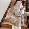 Bolso de Hombro de Gran Capacidad de Aspecto Elevado de Nicho para Mujer 2024 Nuevo Bolso de Lona Ins Bolso Tote Bolso de Mano de Clase Ropa de Trabajo
