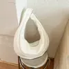 Bolso tipo dumpling liso de estilo coreano para mujer, nuevo modelo 2026, bolso de gran capacidad para el hombro, bolso de hombro de moda nicho