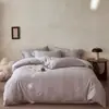 Juego de ropa de cama de cuatro piezas de algodón de fibra larga de grado A con 100 hilos, hecho completamente de algodón puro, nuevo diseño 2025, estilo de lujo ligero y de alta gama, adecuado para el dormitorio principal