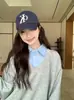 Sudadera informal y sencilla estilo universitario con retazos, imitación de dos piezas para mujer + falda, nueva versión coreana, conjunto de estilo holgado y relajado