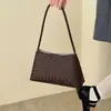 Bolso de axila ligero y lujoso con textura tejida para mujer, nuevo modelo transfronterizo 2026, bolso de mano elegante, bolso de hombro, bolso baguette para el día a día
