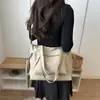 Bolso informal de tela de gran capacidad, nueva moda principios de otoño 2026, ligero, simple, versátil, elegante para llevar al hombro, cruzado y como bolso de mano