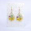 Pendientes de flor seca de epoxi de nueva moda francesa, marco de lámina de oro que conserva el color, pendientes de capullo de flor de epoxi, textura de lujo, temperamento femenino