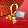 Novo Modelo Ouro Puro 999 Ursinho de Manteiga Criativo Chaveiro de Celular Pingente de Bolsa Presente para Amigos e Família, Disponível para Atacado
