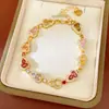 Pulsera de calabaza con incrustaciones de circonita, chapada en oro real de 14 quilates, sensación de lujo ligero de nicho de alta gama, accesorio de mano exquisito y versátil