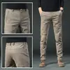 Calças casuais masculinas de alta qualidade de Hong Kong, calças sociais finas de perna reta para o verão, calças compridas da moda estilo coreano, confortáveis e versáteis