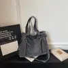Bolsa de mezclilla tipo tote para mujer, modelo nuevo 2026, gran capacidad, versátil para ir al trabajo, bolsa cruzada, bolso grande para que los estudiantes lo usen en clase