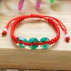 Pulsera de cuerda roja tejida a mano de estilo étnico con imitación de jade original del año, hebilla de la paz, fruta animal de arcilla polimérica suave, cuerda de mano de la suerte