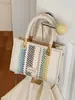 Bolso pequeño cuadrado tejido de estilo étnico con bloques de color y diseño de bolso de mano vintage, adecuado para uso casual, bolso cruzado de nicho para el día a día