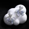 Aretes de perlas con lazo dulce azul claro 2023 nuevos aretes elegantes de moda de alta gama para mujer