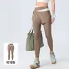 Saia Shorts de Yoga Falsa Duas Peças Color Block com Bolso Embutido Cintura Alta Controle de Barriga Roupa Esportiva Levanta Bumbum Emagrecimento Secagem Rápida Calça Fitness para Mulheres