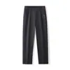 2026 Nueva Primavera y Verano Tela de Algodón Casual para Hombre Pierna Recta Versátil Holgado Moderno Marca Pantalones Largos