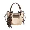 Bolso Moda Textura Viaje Bolso de Hombro Único Cubo Bolso Cruzado Madre-Hija 2026 Otoño Portátil Moderno Elegante Nuevo Coreano