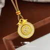 Estilo Tienda de Oro Lujo Ligero Colgante de Bolsa de Dinero de la Suerte Giratorio de Diamante para Mujeres Nuevo Colgante de Bolsa de Dinero Giratorio Incrustado de Diamantes