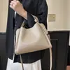 Bolsas de Cuero Suave Nuevas Otoño/Invierno 2025 Bolso Cubo de Alta Gama Moderno Gran Capacidad Bolso de Mano para Viajes Diarios Bolso de Hombro