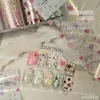 Estilo Coreano Ins Pintado a Mano Graffiti Primavera Arte de Uñas Papel de Transferencia Chica Linda Estrellas de Empalme Lindas Mascotas Decoraciones para Uñas