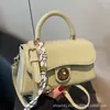 Bolso de Mano Vintage con Hebilla para Estilista Bolso Cruzado Casual Simple para Mujer 2025 Primavera Nuevo Bolso de Hombro Nicho