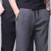 Pantalones casuales de verano de talla grande, finos, de seda de hielo, transpirables, rectos, holgados, modernos, versátiles, de comercio exterior para hombre