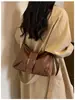 Bolso de hombro tipo tote de nicho estilo coreano para mujer, nueva colección otoño 2026, bolso de motocicleta de alta gama, bolso cruzado para el día a día