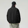Chaqueta reversible de retazos de marca moderna de alta resistencia con cuello alto, abrigo de algodón casual versátil holgado estilo americano para hombre de invierno