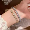Pulsera circular envuelta en circonitas estilo francés, lujo ligero, alta gama, moderna y exquisita, joyería versátil elegante de nicho para mujer