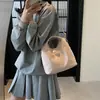 Bolso Cubo de Moda de Alta Gama para Llevar en la Mano 2025 Nuevo Estilo Coreano Trendy Casual de Hombro Cruzado Bolso de Axila para Mujer