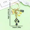 Venta Caliente Transfronteriza Cinta de Música Antigua Saxofón Órgano Llavero Diseño Creativo Sentido Colgante de Bolsa Pequeños Accesorios