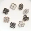 ABS estilo coreano blanco y negro trébol de cuatro hojas DIY pegamento de crema accesorios para joyería pequeños accesorios pendientes pasador de pelo agujero material para zapatos