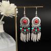 Pendientes de borla de pino bohemio europeo y americano, pendientes huecos de aleación de estilo minoritario Miao de imitación de plata vintage, venta al por mayor