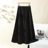 Ropa para mujer talla grande 2026 otoño e invierno falda larga versátil elegante de línea A ajustada al cuerpo falda de punto adelgazante falda negra