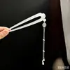 Elegante pasador en forma de U con borlas para mujer, estilo chino tradicional, inspirado en la antigüedad, accesorio para el cabello Hanfu de alta gama, versátil y etéreo, nuevo pasador