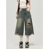 Jeans cortos rasgados de estilo retro americano para mujer, nuevo estilo otoño 2026, shorts holgados de pierna ancha que llegan por encima de la rodilla de longitud media