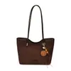 Bolsa feminina grande de cor color-blocking simples, moderna e fashion, nova bolsa de ombro para o dia a dia 2026, bolsa de mão tote com toque de alta qualidade