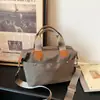 Bolsa transversal de grande capacidade para ir ao trabalho, bolsa tote casual feminina nova e moderna 2026, bolsa de mão em tecido de nylon