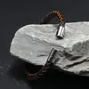 Pulsera de cuero de venta caliente simple para caballero pulsera con hebilla de clavo para hombre pulsera tejida de cuerda de cuero con hebilla magnética de comercio exterior europeo y americano para hombre