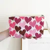 Bolsa de Muñeca con Flores de Amor para el Día de San Valentín Transfronteriza Cremallera de Tela Bolsa de Maquillaje Bolsa de Almacenamiento Cartera Estuche para Lápices Venta al por Mayor