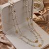 Cadena de Suéter de Camelia Hueca de Perlas con Fragancia Pequeña Transfronteriza Collar Largo para Mujer Colgante para Ropa Venta al Por Mayor al Contado