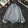 Camisa de manga larga con botones popular para hombre de temporada de primavera y otoño, corte holgado, efecto adelgazante, estilo moderno y artístico, nueva moda japonesa 2026